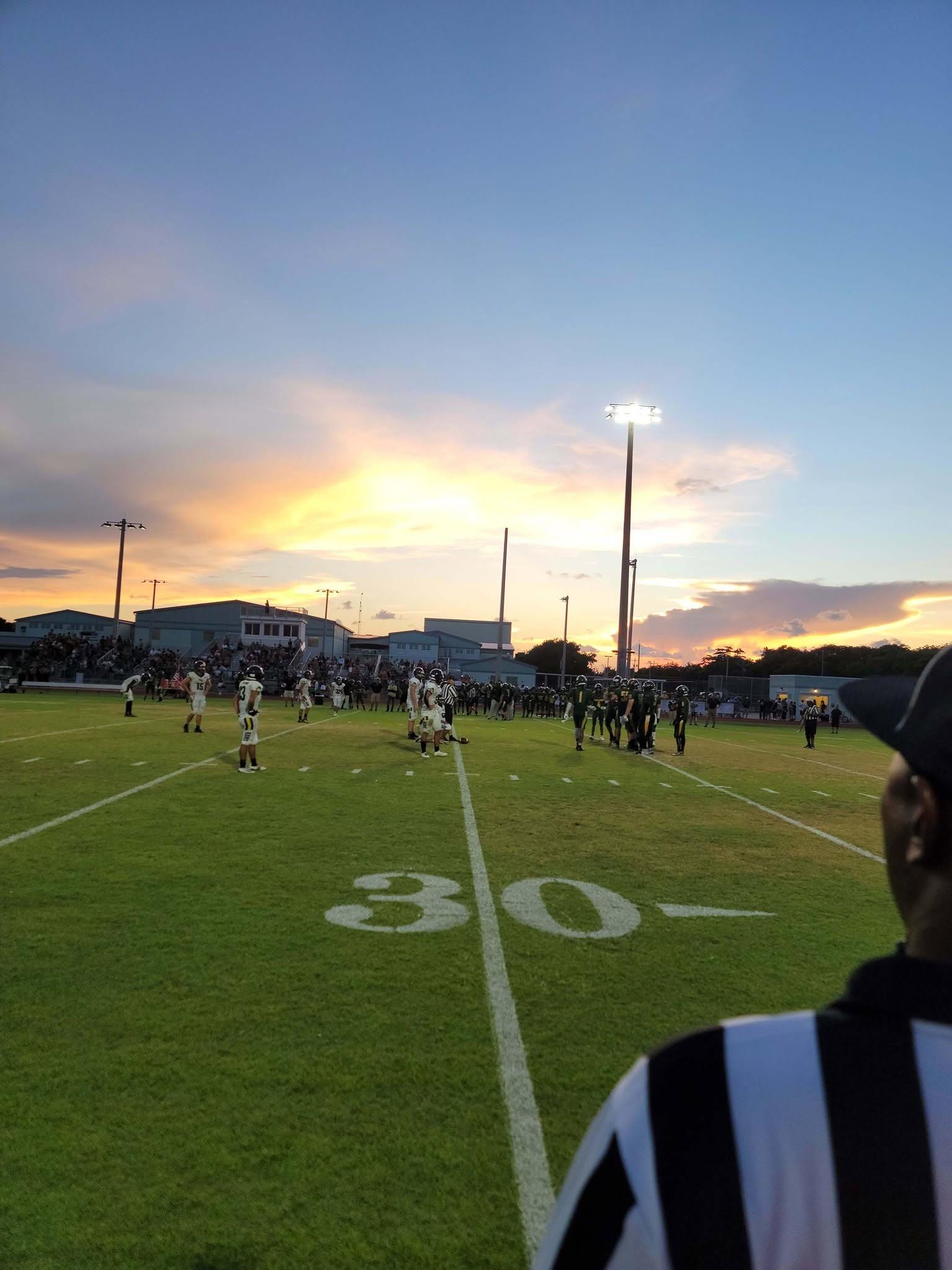 Night game action at the 10-yard line